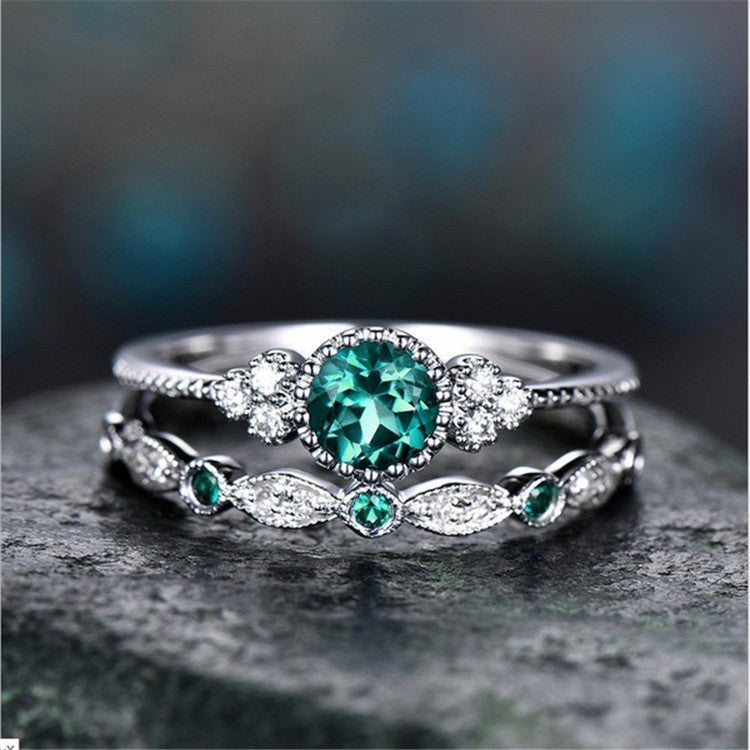 Emerald zircon ring